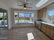 Kitchen includes a ceiling fan, window seat, quartz countertops and stainless appliances at 4608 W Gail Dr, Chandler, AZ 85226