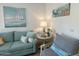 Close up on comfortable sofa with accent pillows and a nautical themed painting at 4608 W Gail Dr, Chandler, AZ 85226