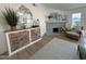 Stylish living room showcasing a decorative fireplace, nautical accents and a cozy atmosphere at 4608 W Gail Dr, Chandler, AZ 85226