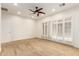Bedroom boasts carpet flooring, ceiling fan and plantation shutters at 5234 E Carol Ave, Mesa, AZ 85206