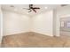 Bedroom featuring carpet flooring and a contemporary ceiling fan at 5234 E Carol Ave, Mesa, AZ 85206
