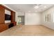 Bedroom featuring carpet flooring, ceiling fan and built-in cabinets at 5234 E Carol Ave, Mesa, AZ 85206
