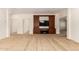 Bedroom offering carpet flooring and a built-in entertainment center at 5234 E Carol Ave, Mesa, AZ 85206