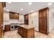 Gourmet kitchen boasts an island and stainless steel appliances at 5234 E Carol Ave, Mesa, AZ 85206