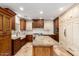 Spacious kitchen offers ample counter space and travertine tile flooring at 5234 E Carol Ave, Mesa, AZ 85206