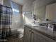 Bathroom with updated vanity and shower-tub combination at 650 N Hawes Rd # 3312, Mesa, AZ 85207