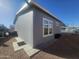 Home exterior and adjacent yard at 650 N Hawes Rd # 3312, Mesa, AZ 85207