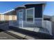 Charming single-Gathering home with carport, small front porch and well-maintained landscaping at 650 N Hawes Rd # 3312, Mesa, AZ 85207