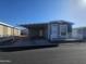 Charming single-Gathering home with carport, small front porch and well-maintained landscaping at 650 N Hawes Rd # 3312, Mesa, AZ 85207