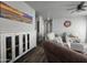 Inviting living room with comfortable seating, ceiling fan and stylish decor at 650 N Hawes Rd # 3312, Mesa, AZ 85207