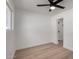 Bedroom featuring a lighted ceiling fan and access to the bathroom at 715 S Saranac Ave, Mesa, AZ 85208
