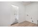Bright laundry room features a utility sink connection and newly painted walls at 715 S Saranac Ave, Mesa, AZ 85208