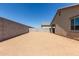 View of the backyard featuring a block wall, offering privacy and space for various outdoor activities at 7224 W Puget Ave, Peoria, AZ 85345