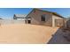 The backyard includes a gate, and a retaining wall, perfect for outdoor activities and relaxation at 7224 W Puget Ave, Peoria, AZ 85345