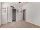 Bedroom offers ample closet space and neutral carpet at 7224 W Puget Ave, Peoria, AZ 85345