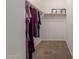 Walk-in closet features built-in shelving for clothing and accessories at 7224 W Puget Ave, Peoria, AZ 85345