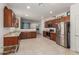 Bright kitchen with stainless steel appliances, lots of cabinet space, and a view into the living areas at 7224 W Puget Ave, Peoria, AZ 85345