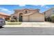 Charming two-story home with a well-maintained front yard and a two-car garage at 7243 W Sandra Ter, Peoria, AZ 85382