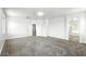 Bright main bedroom showcases neutral carpet, recessed lighting, and ensuite access at 7243 W Sandra Ter, Peoria, AZ 85382