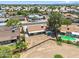 Aerial view of a neighborhood featuring well-maintained homes and a spacious backyard, offering a serene environment at 7430 E Ed Rice Ave, Mesa, AZ 85208