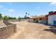 Large backyard featuring a block wall, providing privacy and space for landscaping or recreational use at 7430 E Ed Rice Ave, Mesa, AZ 85208