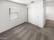 Bedroom featuring neutral carpet and a window at 8218 W Illini St, Phoenix, AZ 85043