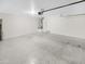 Spacious garage with epoxy floors and ample storage space at 8218 W Illini St, Phoenix, AZ 85043