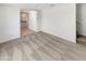 Open-concept living room offers seamless flow and neutral carpet at 8218 W Illini St, Phoenix, AZ 85043
