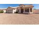 Lovely single-story home featuring a well-manicured front yard, a two-car garage, and a welcoming entrance at 871 W Mesquite St, Gilbert, AZ 85233