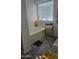 Relaxing bathroom featuring a soaking tub, modern fixtures, and stylish flooring at 9205 W Williams St, Tolleson, AZ 85353