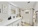 Well-lit bathroom with modern vanity, black hardware, and a combined shower and tub at 10538 E Gold Dust Cir, Scottsdale, AZ 85258
