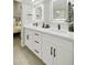Modern bathroom with double sinks, quartz countertops, and updated fixtures at 10538 E Gold Dust Cir, Scottsdale, AZ 85258