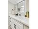 Bright bathroom featuring an illuminated mirror, black fixtures, and ample counter space at 10538 E Gold Dust Cir, Scottsdale, AZ 85258