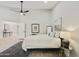 Spacious main bedroom featuring wood-look floors and neutral décor at 10538 E Gold Dust Cir, Scottsdale, AZ 85258