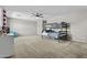 Carpeted bedroom features bunkbeds, ceiling fan and an open design at 11521 E Quintana Ave, Mesa, AZ 85212