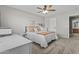 Bedroom featuring a neutral color scheme, ceiling fan, and white furniture at 11521 E Quintana Ave, Mesa, AZ 85212