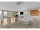 Spacious bonus room with wood floors, providing versatile space for entertainment and relaxation at 11521 E Quintana Ave, Mesa, AZ 85212