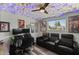 A bedroom with a ceiling that features lights under cotton batting for a cloud effect, and theater-style seating at 1321 W 14Th St, Tempe, AZ 85281