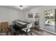 Bright dining area with modern table, bench seating, and natural light and backyard access at 1321 W 14Th St, Tempe, AZ 85281