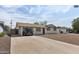 Charming single-story home with a covered carport and low maintenance desert landscaping at 1321 W 14Th St, Tempe, AZ 85281