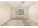 Bedroom with a window offering natural light at 136 E San Angelo Ave, Gilbert, AZ 85234