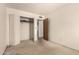 This bedroom includes a closet for storage at 136 E San Angelo Ave, Gilbert, AZ 85234