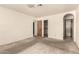 A bright room with multiple closets and entryways at 136 E San Angelo Ave, Gilbert, AZ 85234