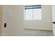 Bedroom view featuring a window, neutral walls, and carpet floors at 1623 E Hidalgo St, Apache Junction, AZ 85119