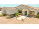 Beautiful single-story house with a well-maintained front yard, stylish stone accents, and a welcoming entrance at 1623 E Hidalgo St, Apache Junction, AZ 85119