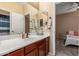 Cozy bathroom features a spacious vanity and neutral color palette at 16259 W Papago St, Goodyear, AZ 85338