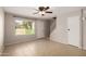 Spacious living area with natural light, tile floors, and a view of the well-kept community at 19601 N 7Th St # 1022, Phoenix, AZ 85024