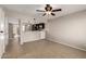 Open-concept living area adjacent to the modern kitchen, creating a seamless flow for entertaining at 19601 N 7Th St # 1022, Phoenix, AZ 85024
