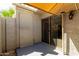 Enclosed patio space with exterior storage, sun shade, and sliding glass door at 19601 N 7Th St # 1022, Phoenix, AZ 85024