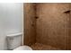Tiled stand up shower with built in shelves and updated shower head at 2233 W Oraibi Dr, Phoenix, AZ 85027